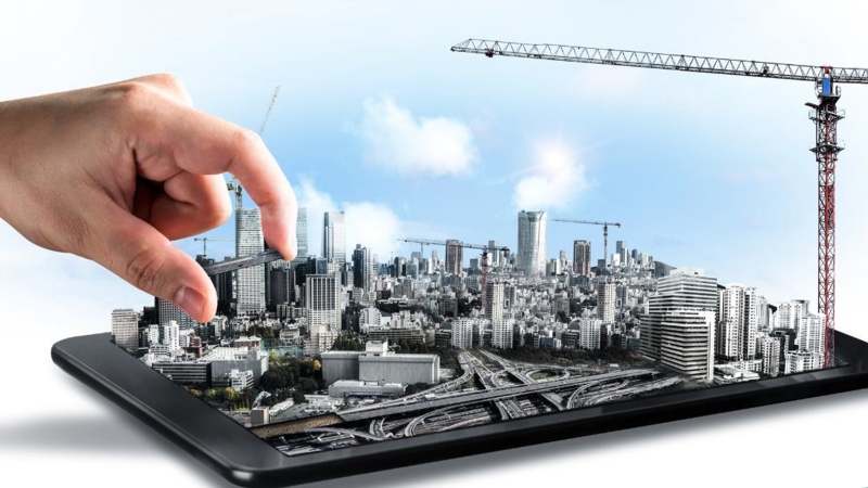 An iPad with a 3D city rising up out of its screen